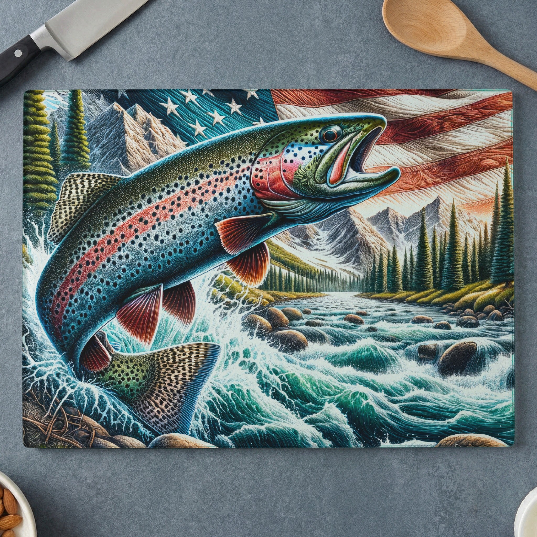 Rainbow trout leaps from river below American flag and mountains.