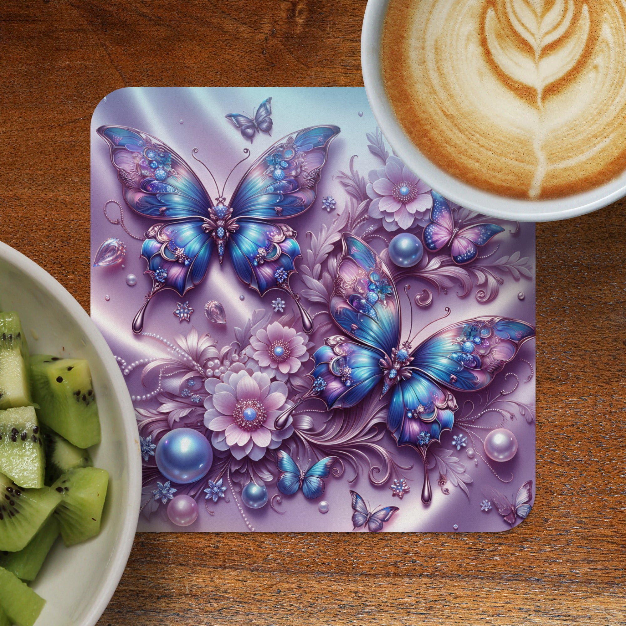 Two iridescent blue butterflies surrounded by flowers, pearls, and crystals on a placemat.