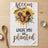 Sunflowers and butterflies on a kitchen towel with "Bloom where you planted" text.
