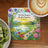 Floral landscape coaster with "We love because he first loved us." scripture.