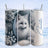 Arctic fox on a snowy background with snowflake and dreamcatcher design.