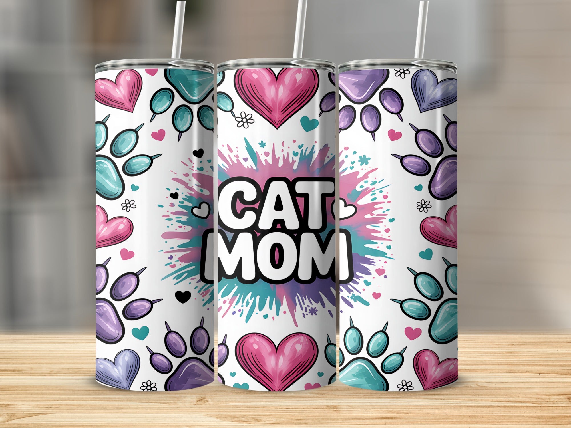 Three tumblers with "Cat Mom" text, paw prints, and hearts.