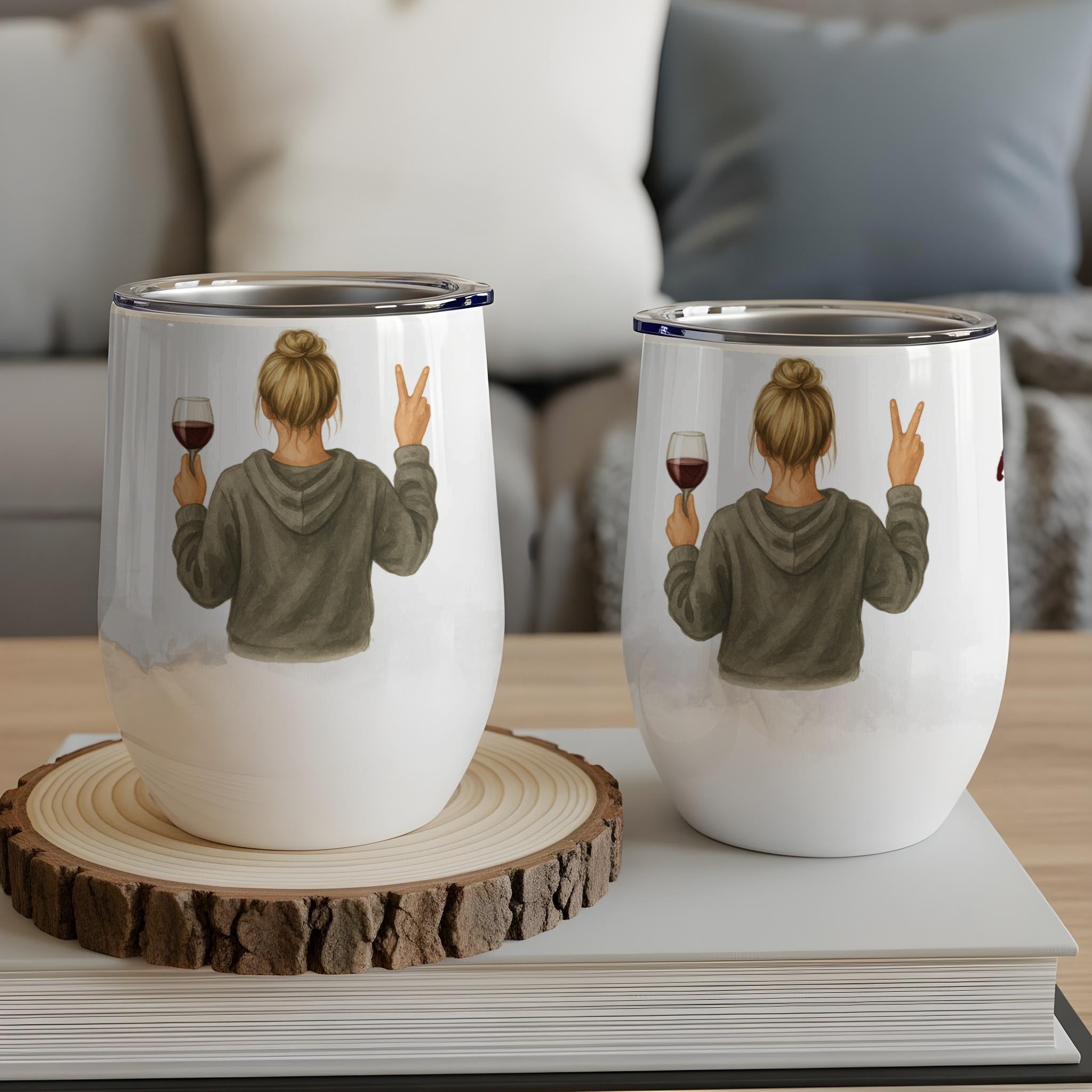 Two wine tumblers with a woman giving a peace sign, holding wine.