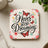 Coaster with "Never stop Dreaming" text, butterflies, and floral accents.
