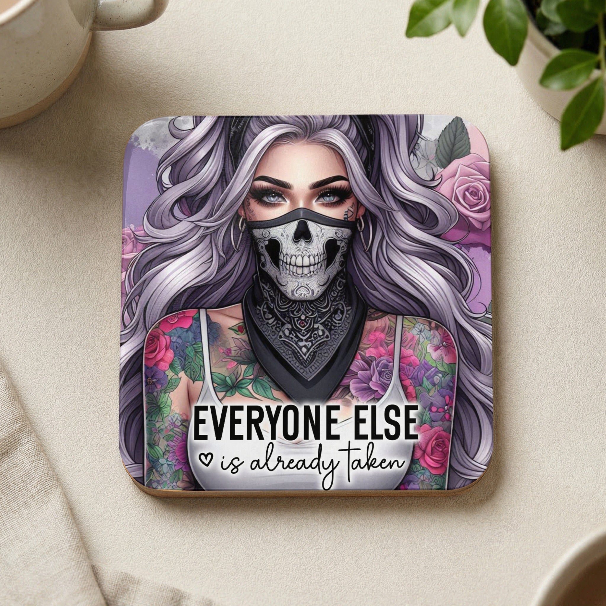 Woman with skull mask, tattoos, and text "EVERYONE ELSE is already taken".