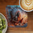Coaster with Native American warrior in headdress and spear, next to coffee and kiwi.
