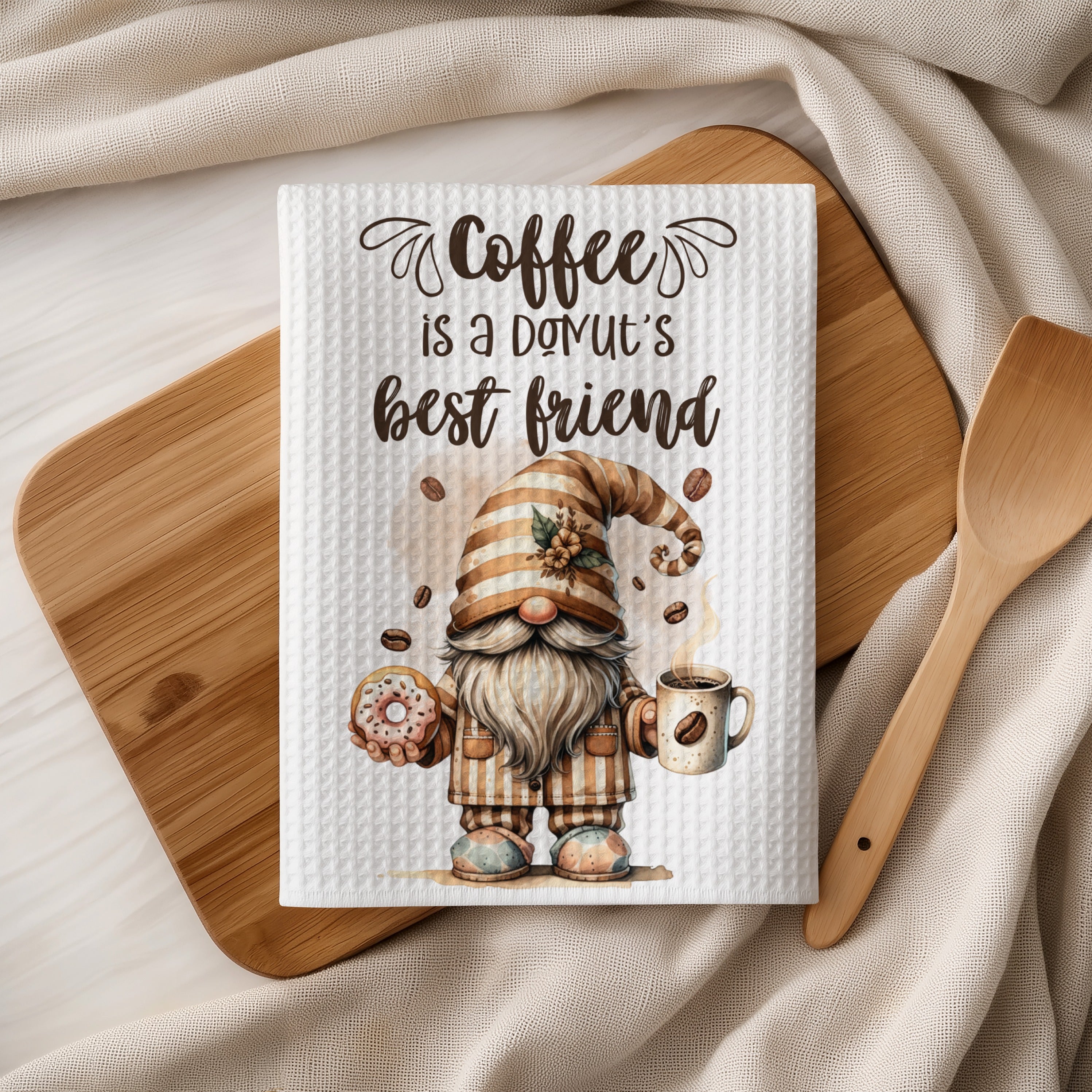 Gnome holding donut and coffee mug with text "Coffee is a donut's best friend".