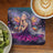 Fairy with colorful wings and purple dress praying, with coffee and kiwi.