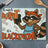 Cartoon raccoon in apron holds blackened toast with text "It ain't burnt, it's blackened!".
