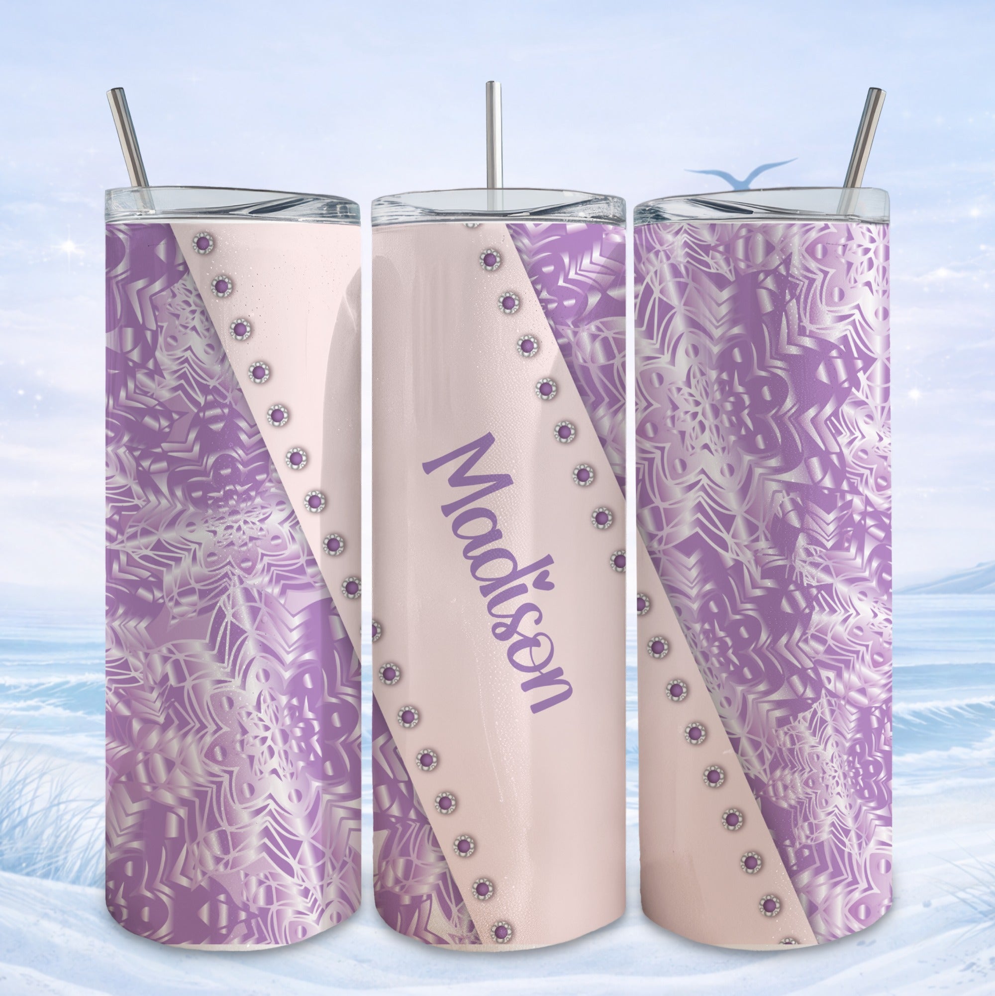 Purple and white snowflake patterned tumbler with "Madison" text.