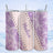 Purple and white snowflake patterned tumbler with "Madison" text.
