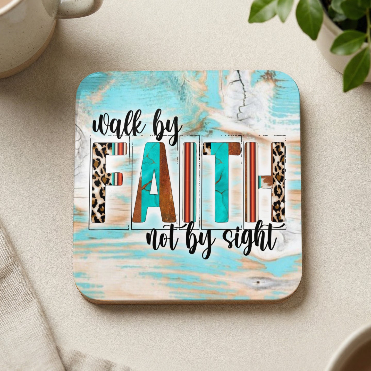 Wooden coaster with "walk by faith not by sight" text and leopard print accents.
