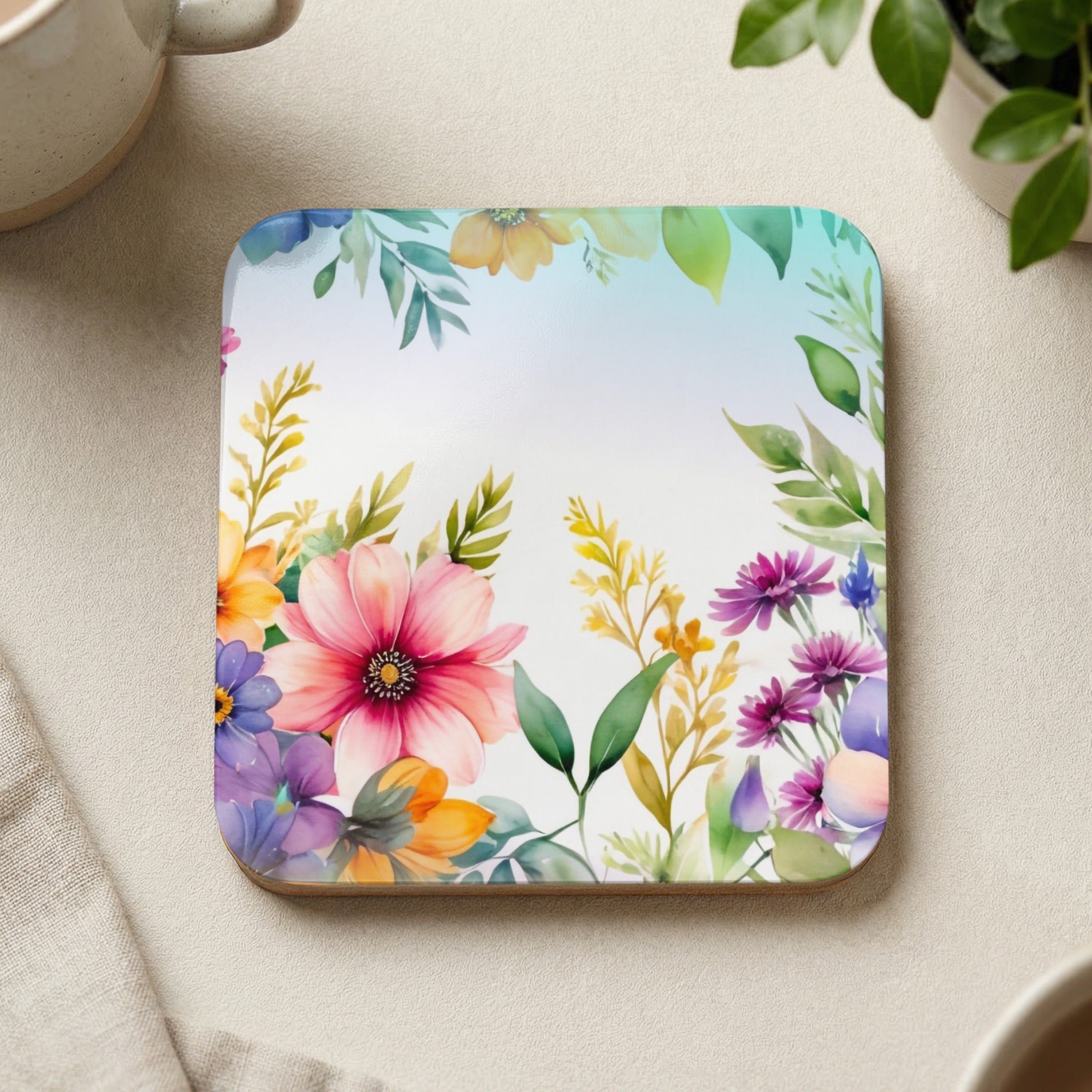 Square coaster with a watercolor floral border and a light blue gradient background.