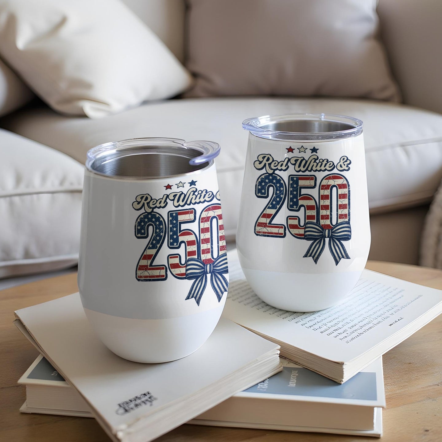 Two white tumblers with red, white, and blue patriotic designs and "250" text.