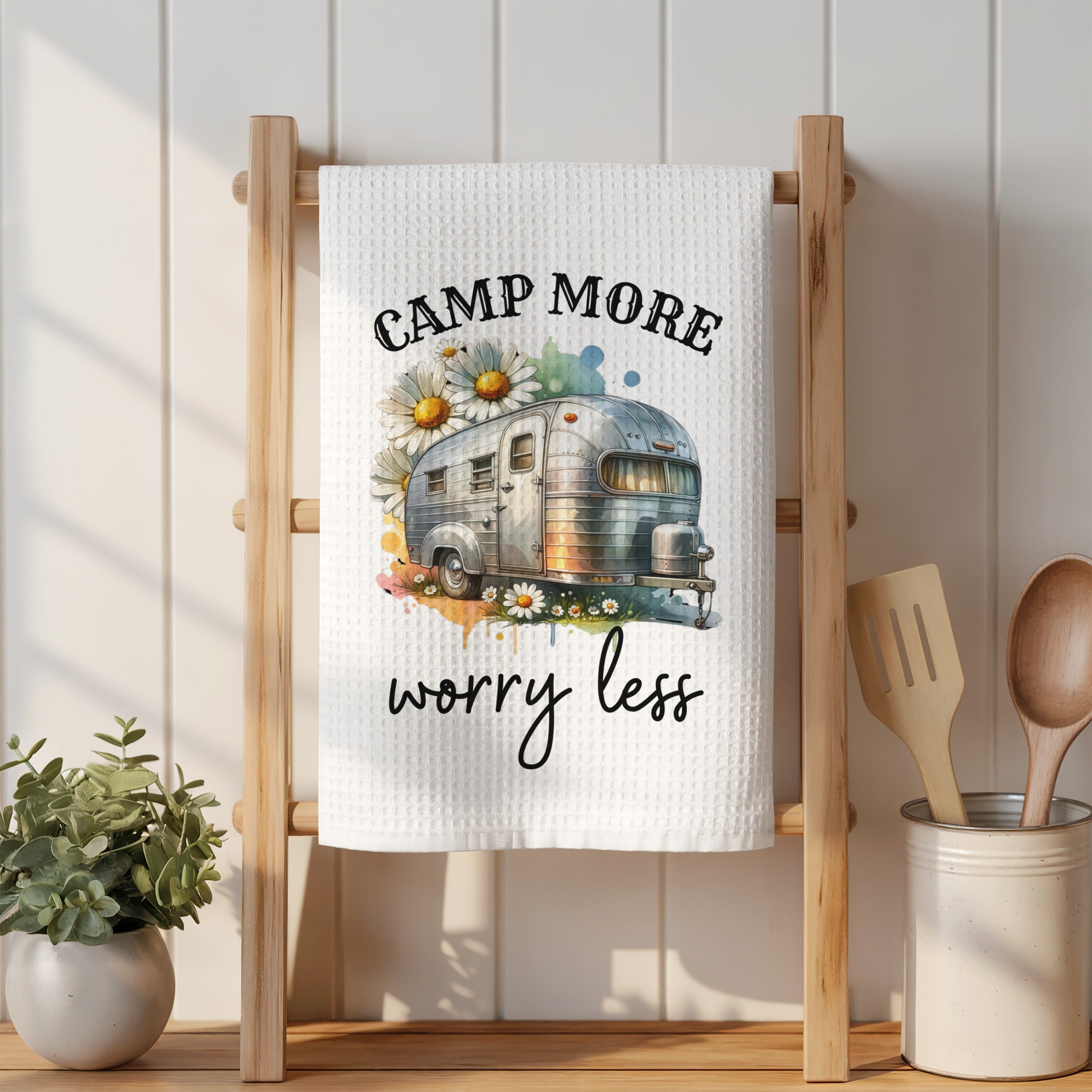 White waffle weave towel with a vintage camper and "Camp More Worry Less" text.