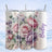 Floral tumbler with pink and purple flowers and "Bailey" text.