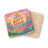 Two colorful coasters with a retro floral design and the text "Make Someone Smile Today".