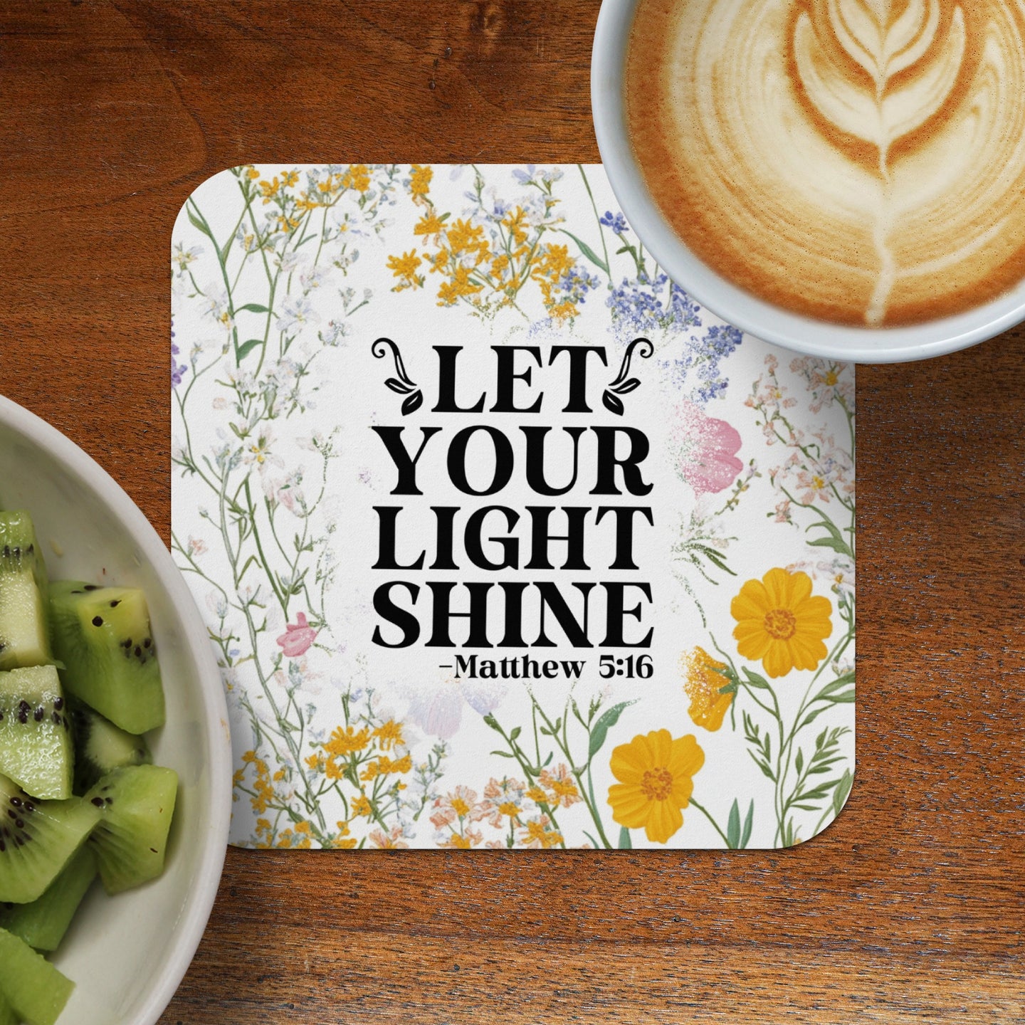Square coaster with floral design and "LET YOUR LIGHT SHINE" quote.
