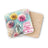 Coaster with dandelions and the text "Love grows kindness planted".
