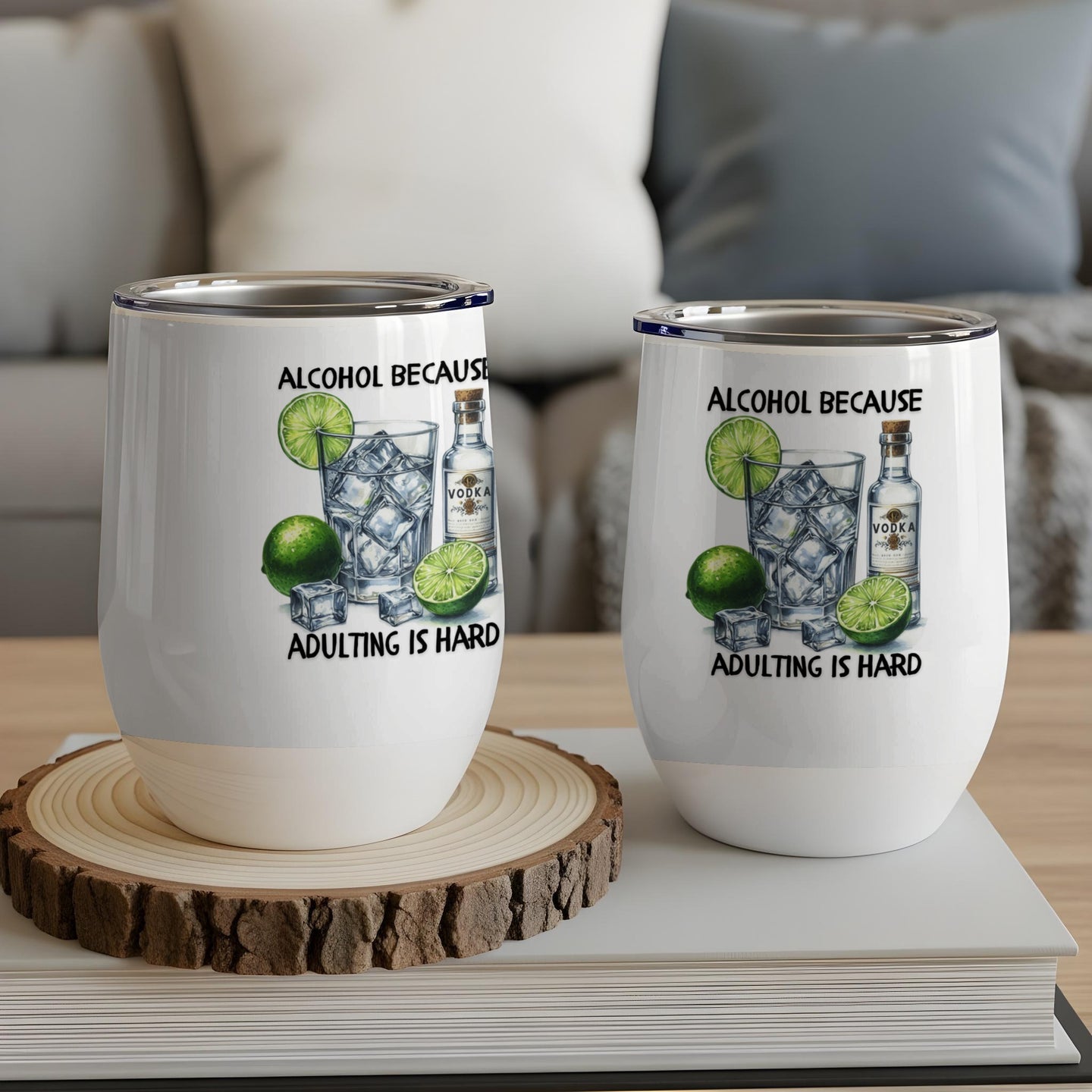 Two wine tumblers with "Alcohol Because Adulting is Hard" text and drink illustration.