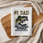 Tea towel with "#1 Dad Bass Whisperer" text and a jumping bass fish graphic.
