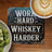 Coaster with "WORK HARD WHISKEY HARDER" text, next to coffee and kiwi.