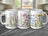 Three white mugs featuring watercolor wildflowers in various colors.