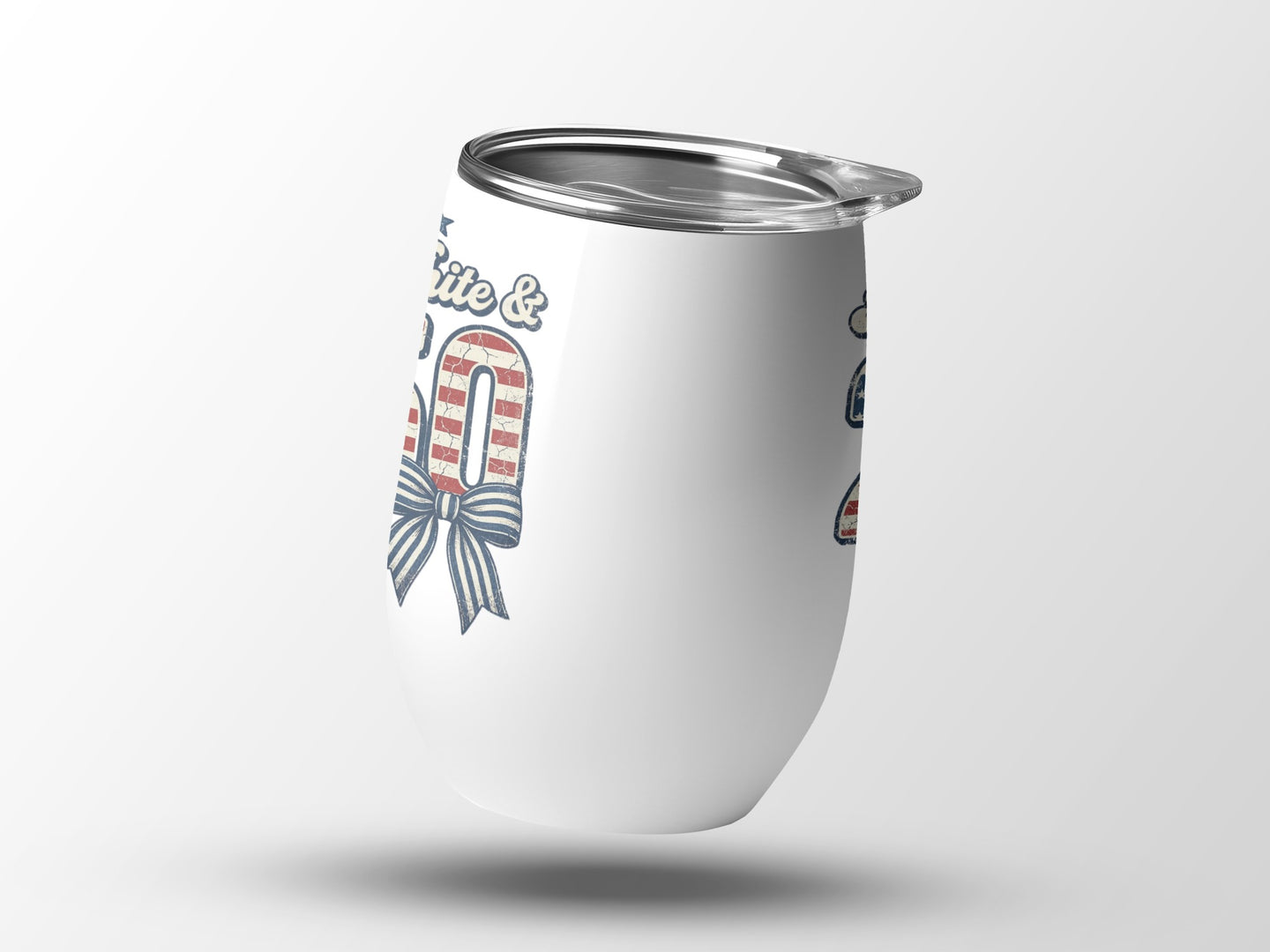 White tumbler with red, white, and blue patriotic design and bow.