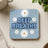 Blue coaster with white daisies and "DEEP BREATHS" text.