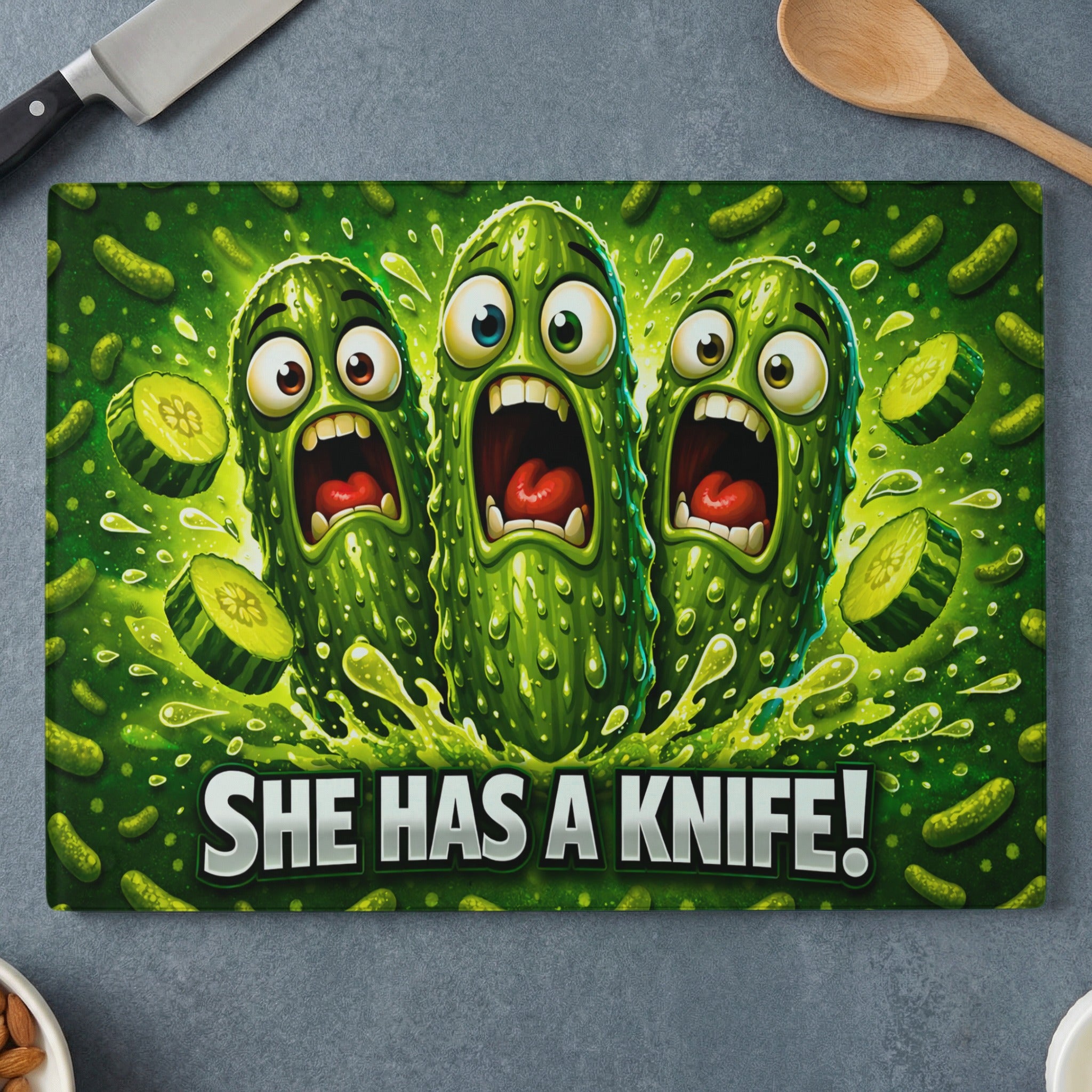 Three cartoon pickles scream in terror as a knife approaches, with text "SHE HAS A KNIFE!".