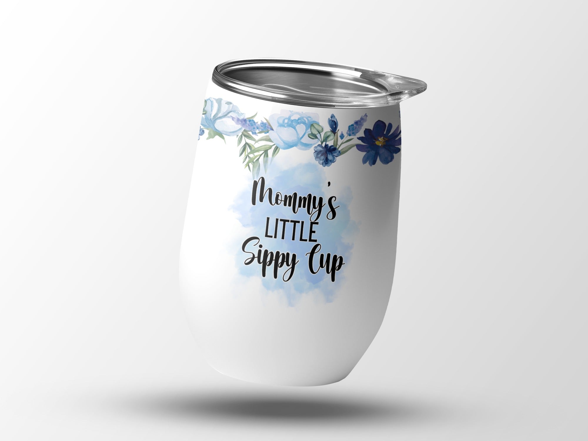 White stemless tumbler with blue floral accents and "Mommy's Little Sippy Cup" text.