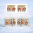 White mug with "Best Dad Ever" text in retro style, set against snowy backdrop.