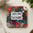 Square coaster with "You are enough" in script surrounded by colorful flowers.