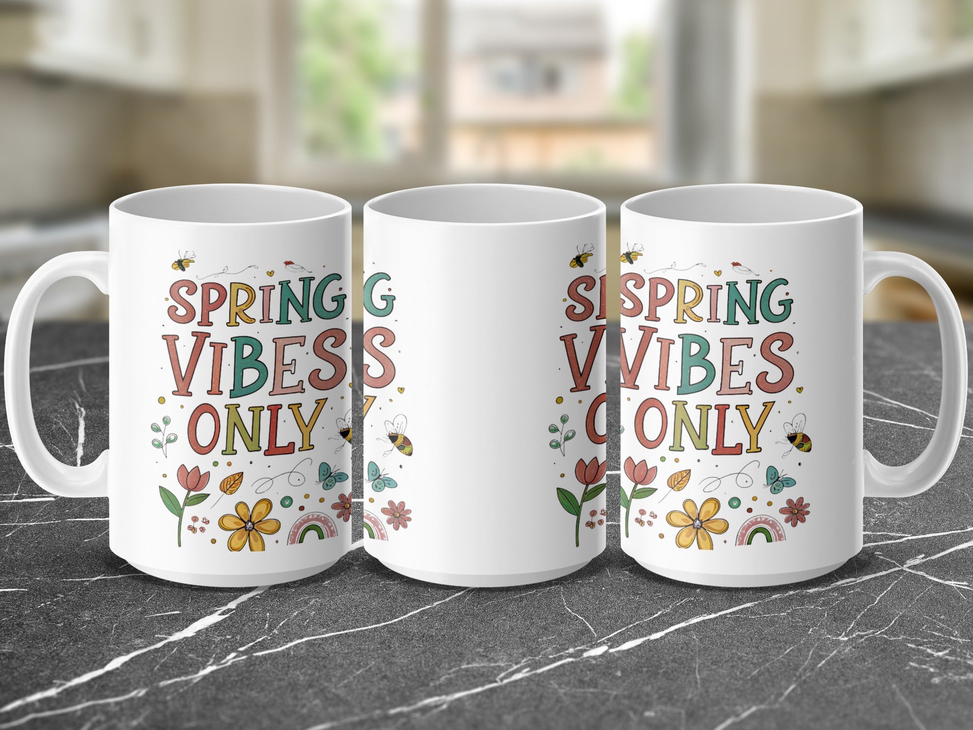 Three mugs with "Spring Vibes Only" text and floral, bee, and rainbow designs.