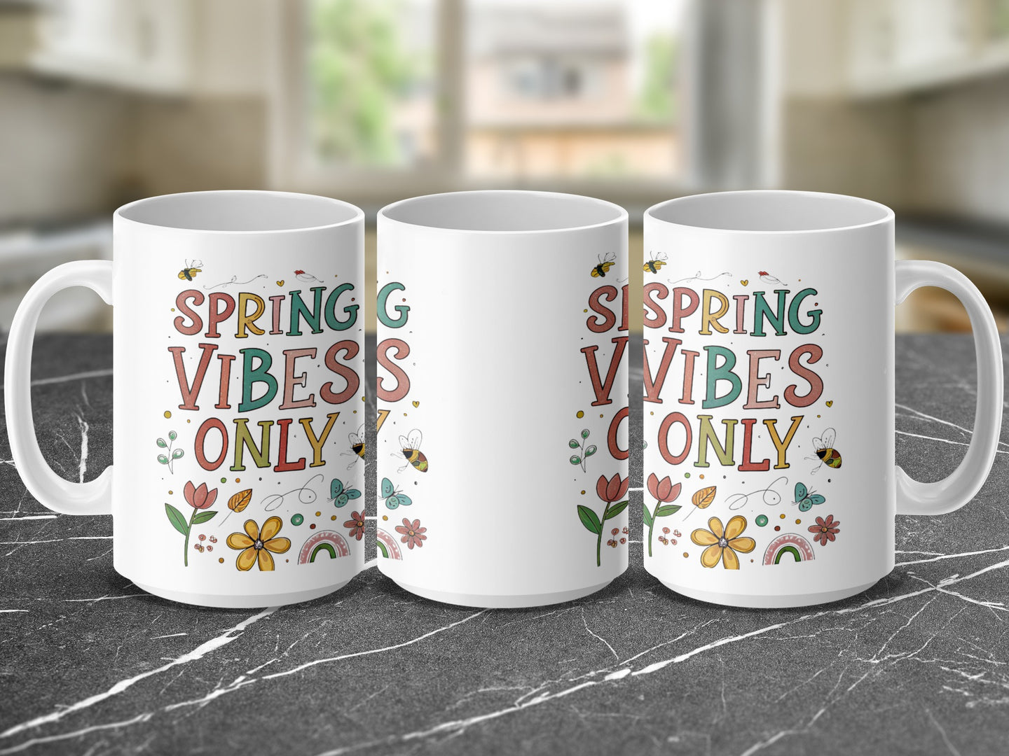 Three mugs with "Spring Vibes Only" text and floral, bee, and rainbow designs.