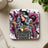 Woman with tattoos and colorful butterflies, surrounded by flowers, saying "stay positive."