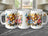 White mug with butterflies, flowers, and "Happy Birthday" text.