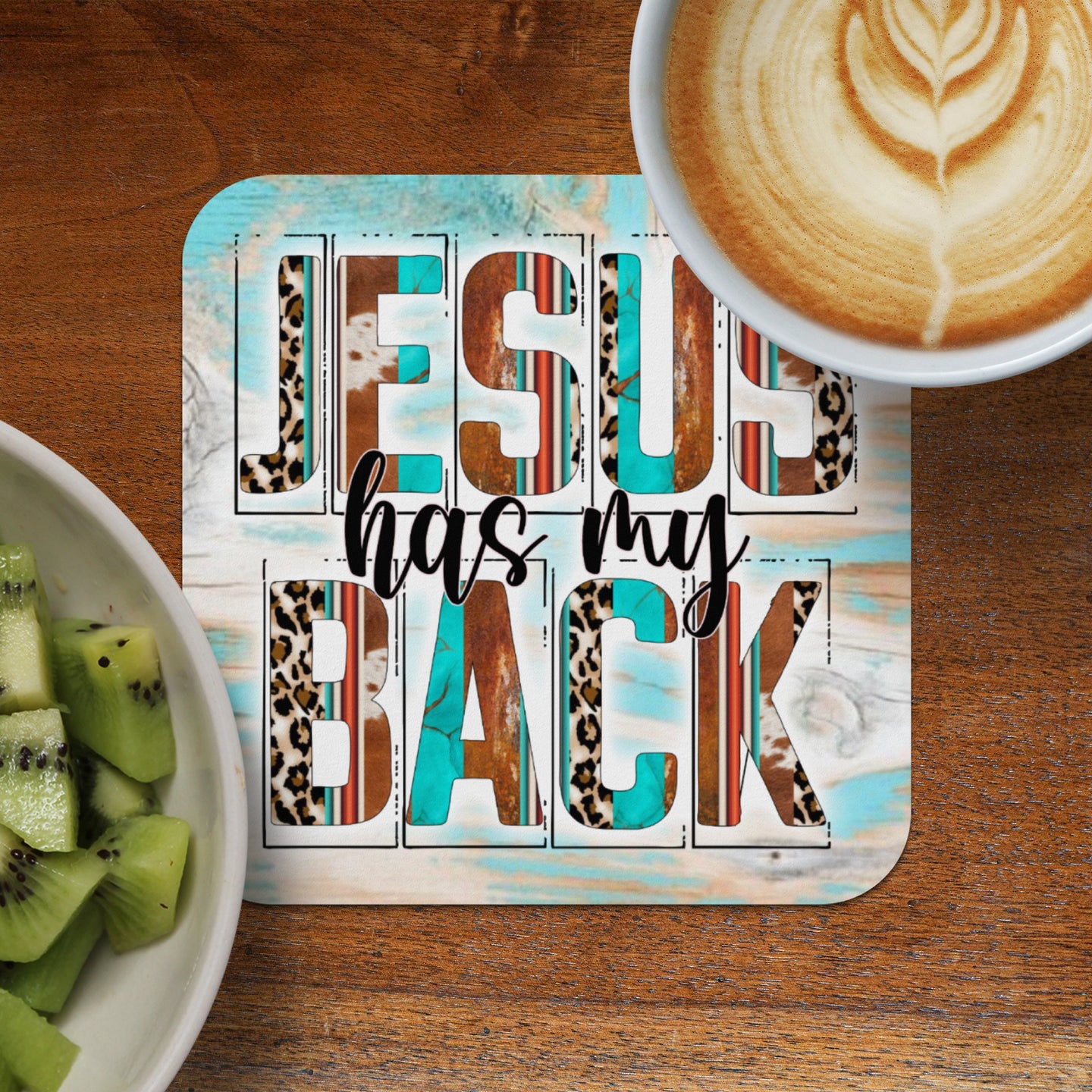 Jesus has my back text with leopard and turquoise wood background.