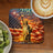 Statue of Liberty with US flag, fireworks, and text "250 Years 1776-2026".