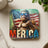 Sasquatch wearing sunglasses and holding American flag, giving thumbs up.