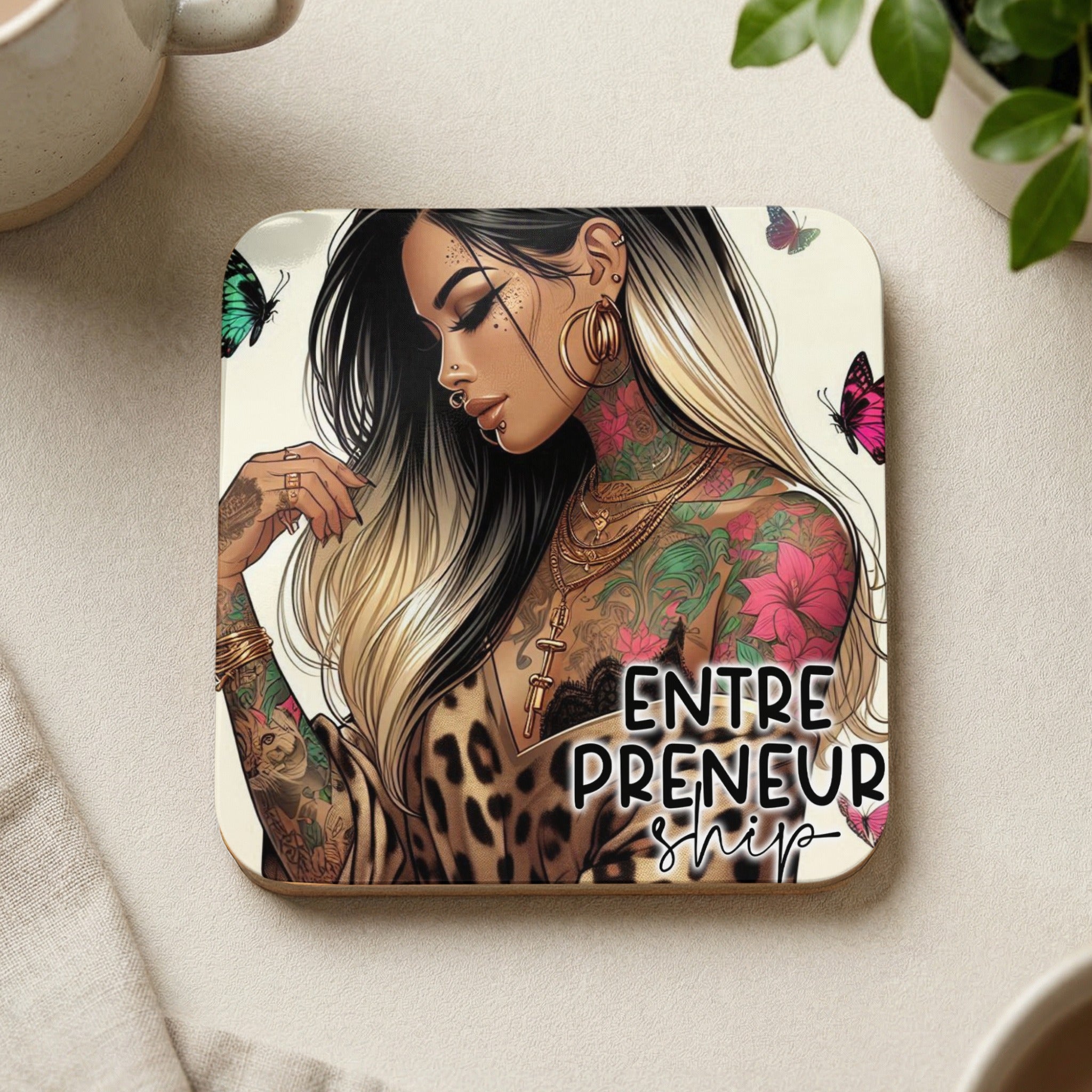 Woman with tattoos and butterflies, "Entrepreneurship" text on coaster.