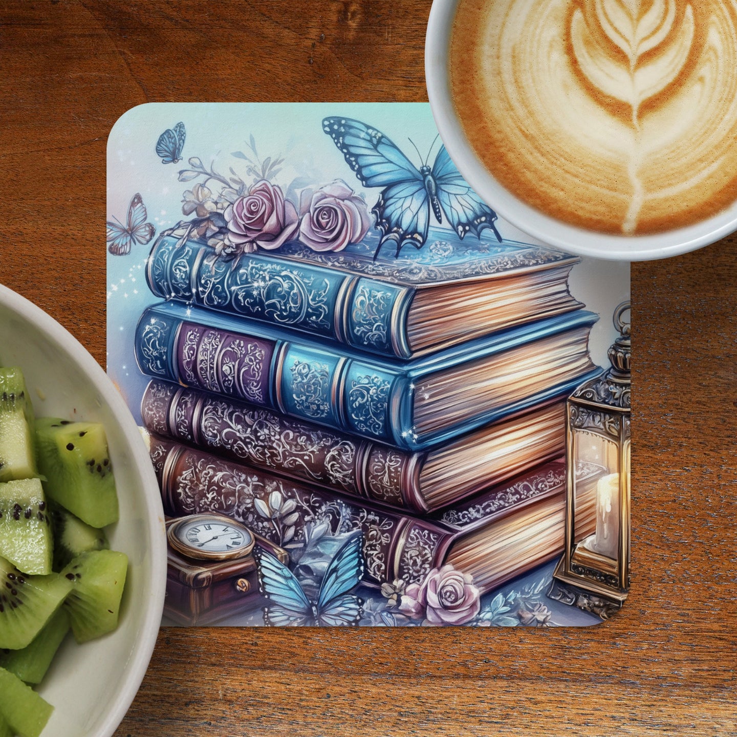 Stack of ornate antique books with butterflies and a lantern, beside kiwi slices and coffee.