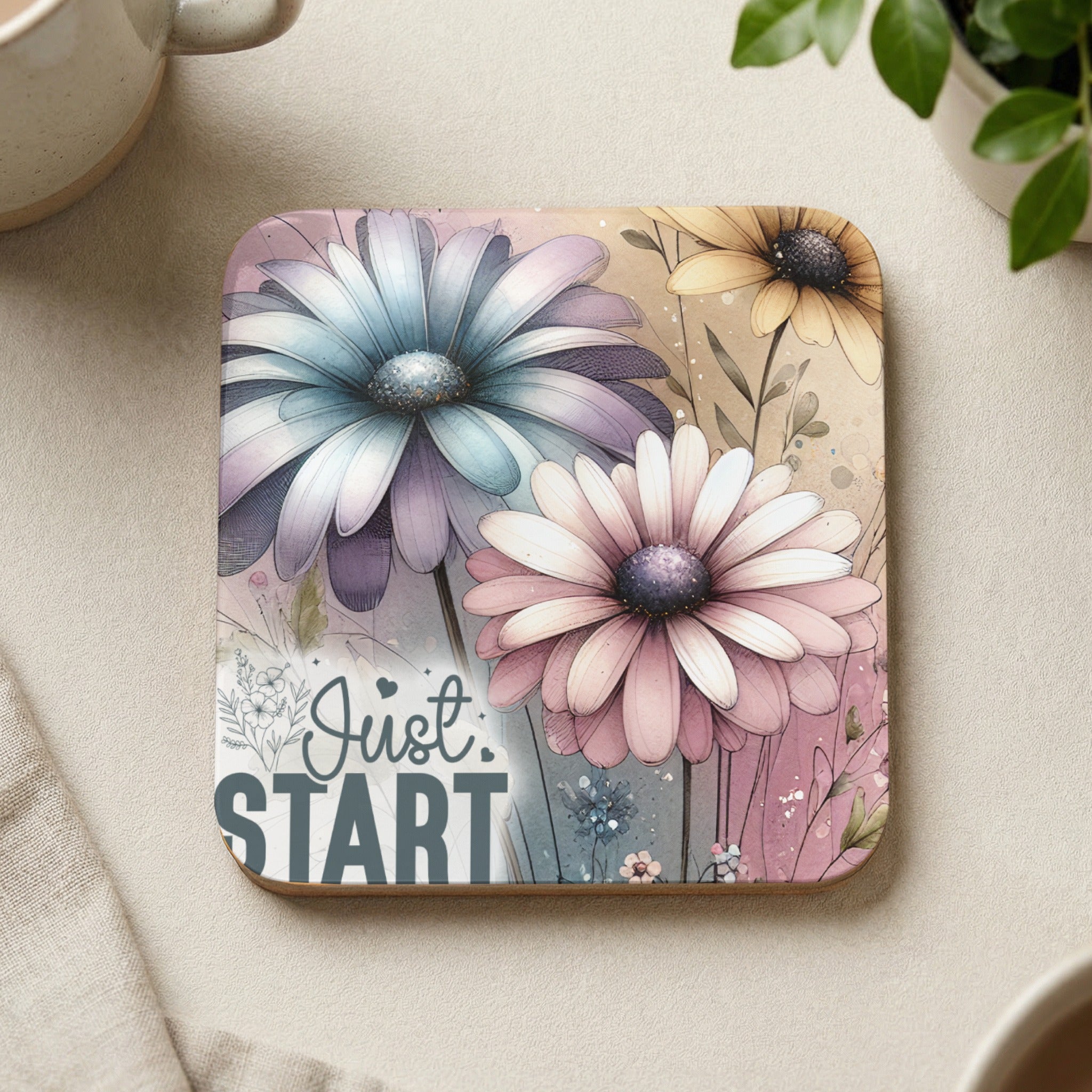 Coaster with watercolor flowers and text "Just. START."