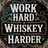 Wooden sign with "WORK HARD WHISKEY HARDER" text on a dark background.