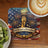 Coaster with Statue of Liberty torch, fireworks, and "250 Years of Freedom 1776-2026" text.