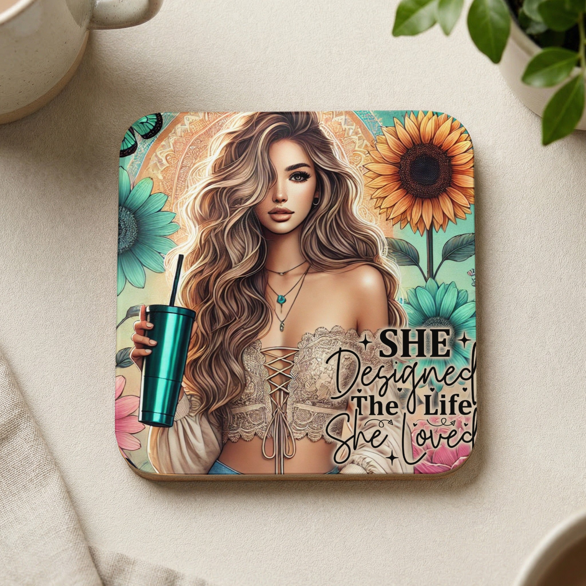 Woman holding teal cup with "SHE Designed the Life She Loved" text.