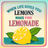Pink lemonade sign with a lemon and leaves.