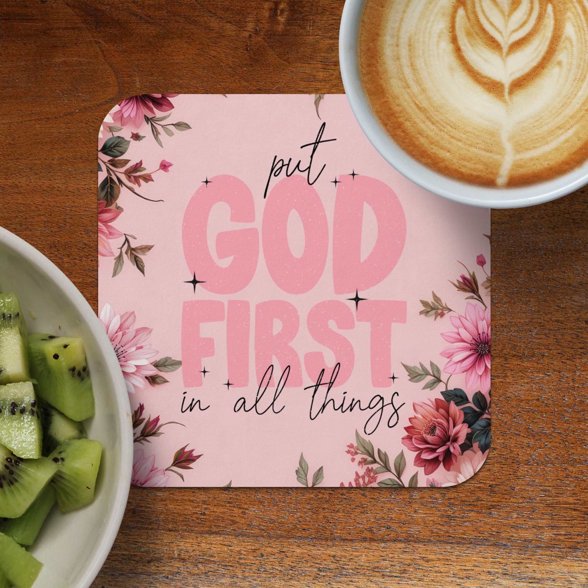 Pink coaster with "God First in all things" text and floral design.