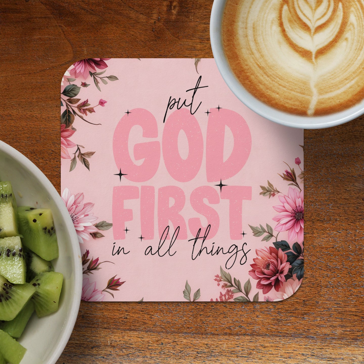 Pink coaster with "God First in all things" text and floral design.