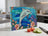 Stained glass cutting board with dolphin and floral design.